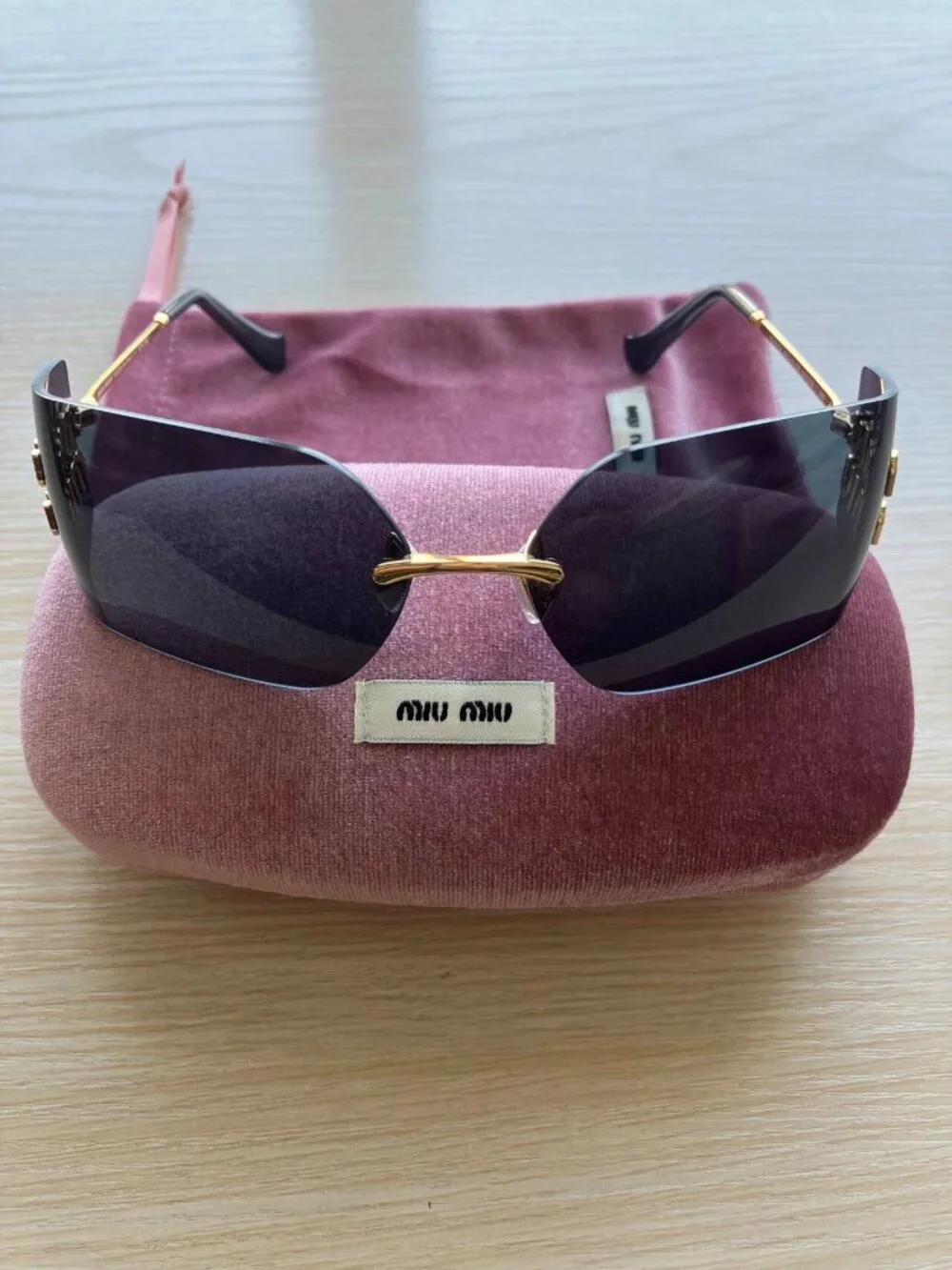 Miu Miu MU54YS Gold Logo Rimless Sunglasses